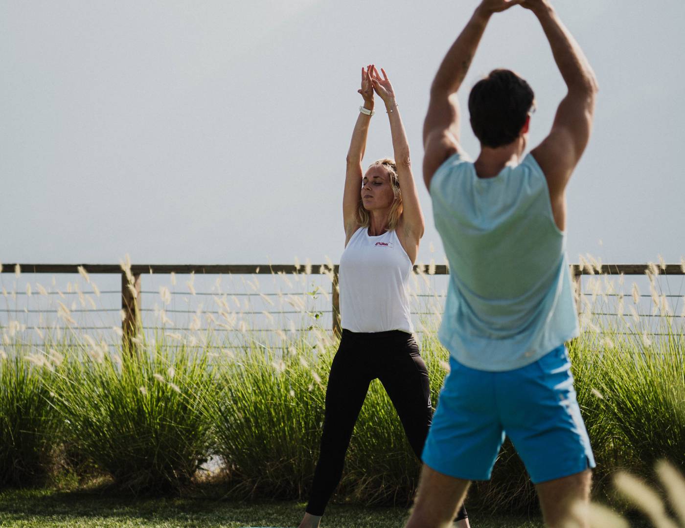 Yoga-Session im Erika-Garten des Wellnesshotels in Dorf Tirol